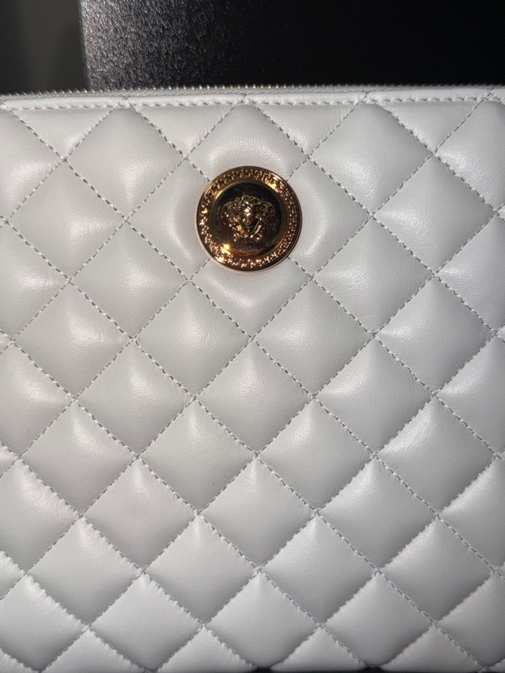 White Quilted Women's Clutch Bag with Gold Medallion